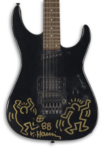 KEITH HARING (1958-1990)  Guitar featuring an orginal Haring drawing.
